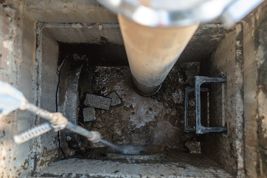 NG Companies close up of line jetting hose in sewer