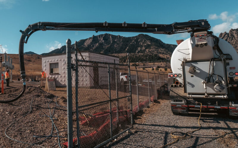hydrovac truck performing vacuum excavation